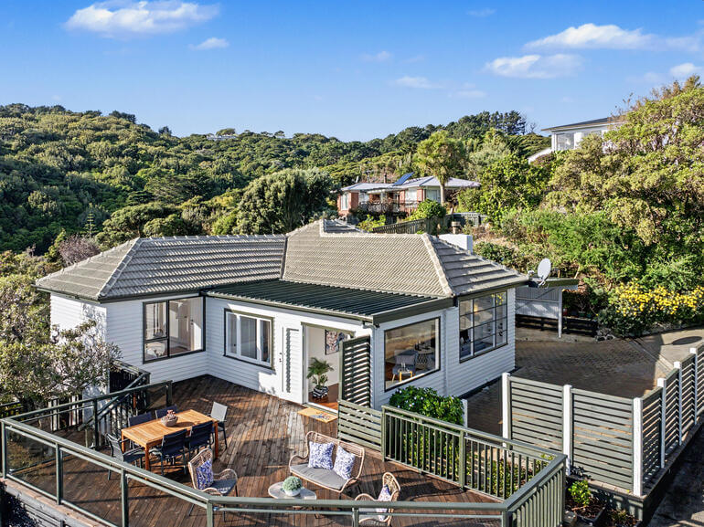 Before-and-after comparison of AI-enhanced real estate photo editing, showing improved brightness, color, and image clarity.