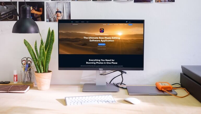 ON1 Photo RAW desktop photo editing software displayed on a monitor, featuring AI-powered tools for RAW processing, image enhancement, and workflow management.