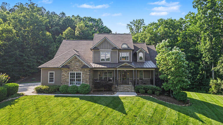 Before and after comparison of a house exterior demonstrating AI real estate photo editing.