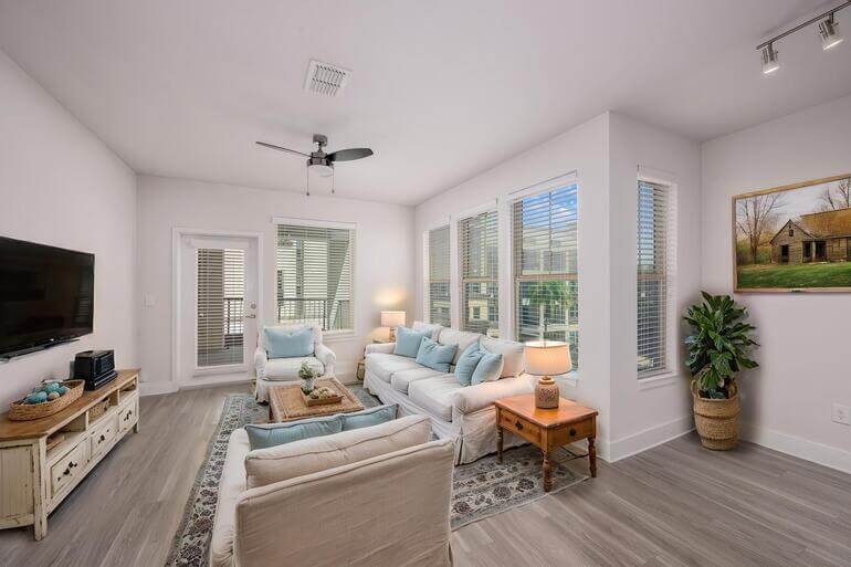 Real estate AI virtual staging before and after comparison of a living room.