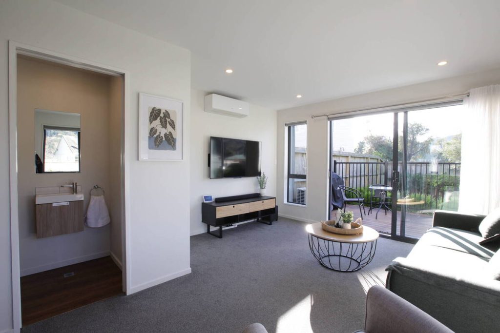 AI photo editing for real estate improves a modern living room.