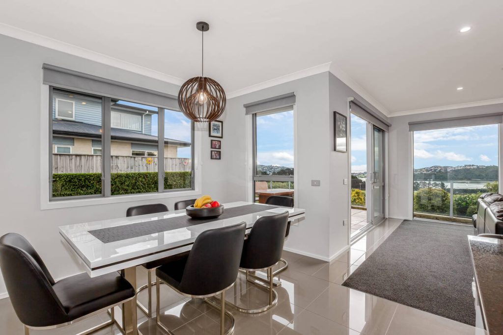 Dining room after AI photo editing for real estate.