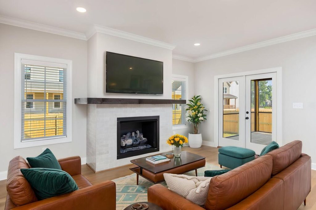 AI photo editing for real estate virtually stages a living room.