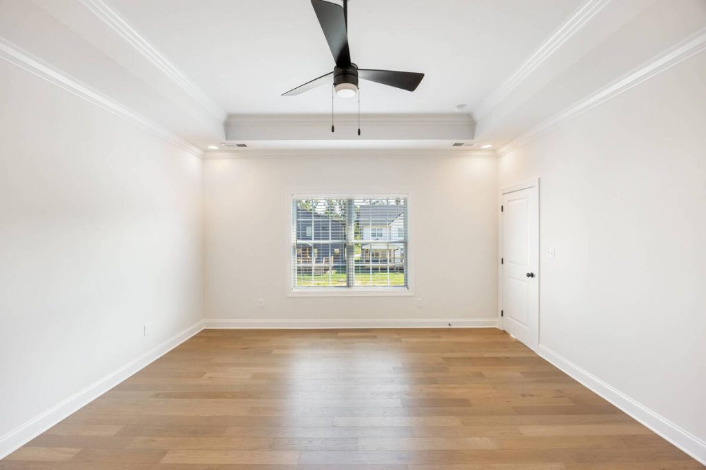 Spacious vacant primary bedroom prepared for AI virtual staging.