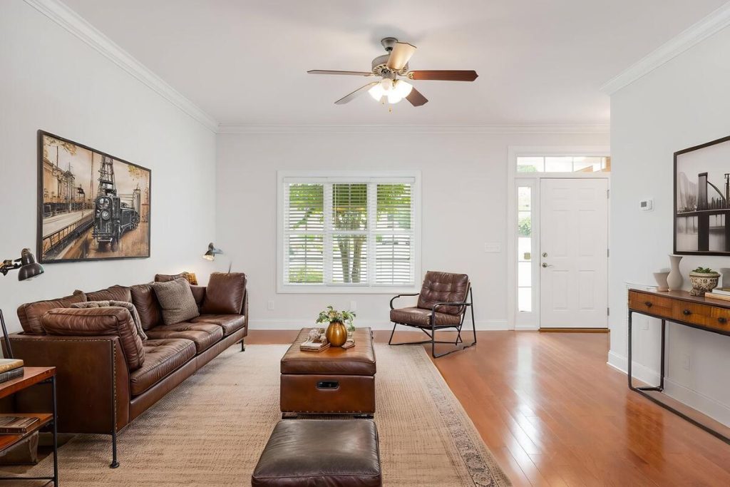 Modern industrial living room using virtual home staging software