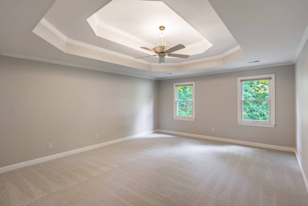 Empty master bedroom before virtual home staging software