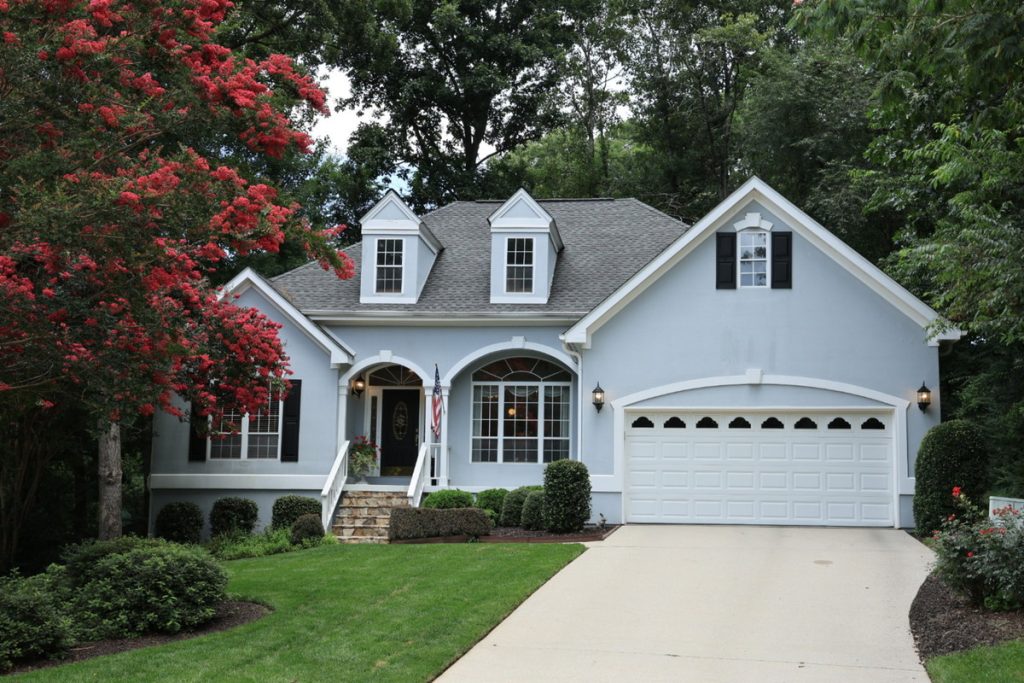 Exterior home photo before lighting and color enhancements