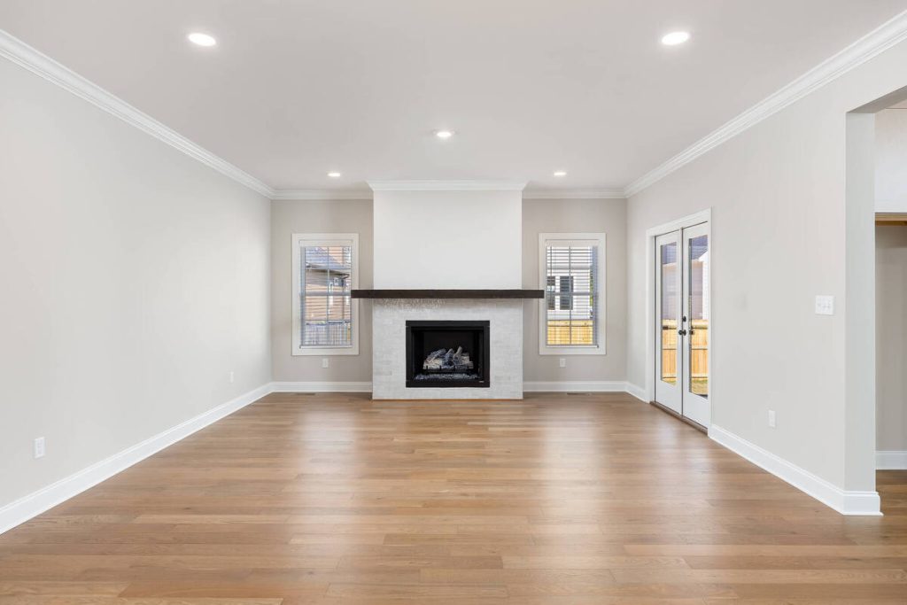 Empty open-concept dining room before virtual home staging services