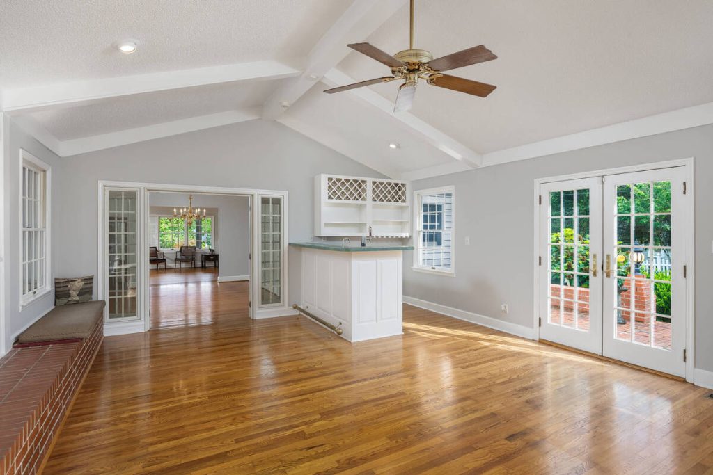 Empty entertaining room before virtual home staging services