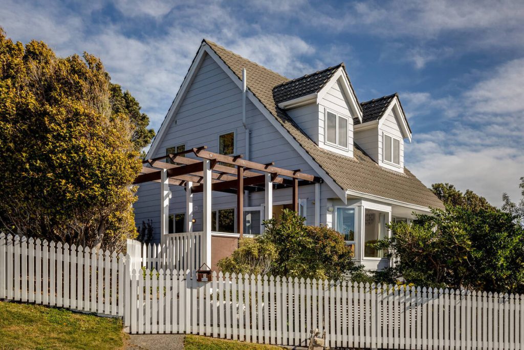 Home exterior after real estate photo editing AI enhancement