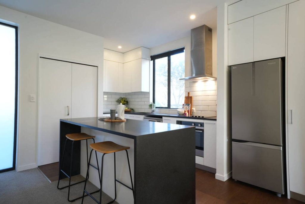 Kitchen before real estate photo editing AI image enhancement.