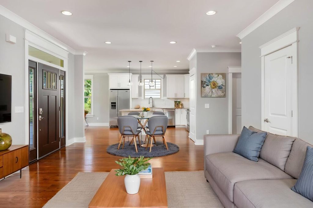 Contemporary living room styled using real estate photo editing AI.
