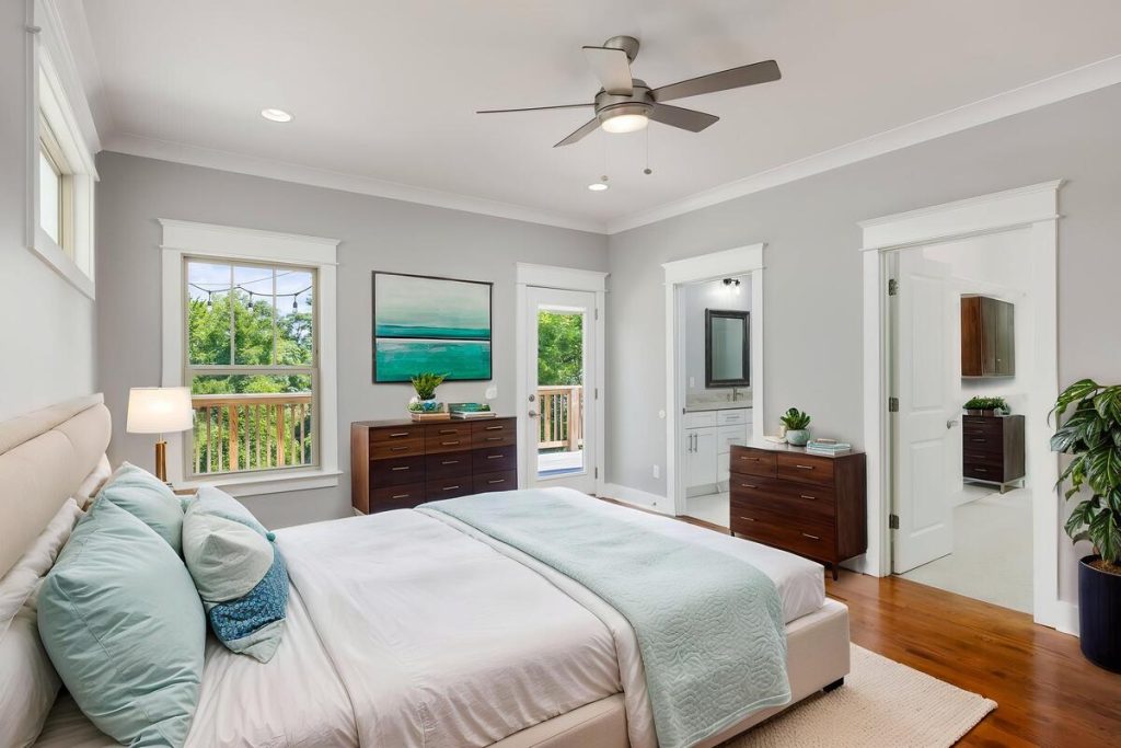 Bright staged bedroom enhanced by real estate photo editing AI