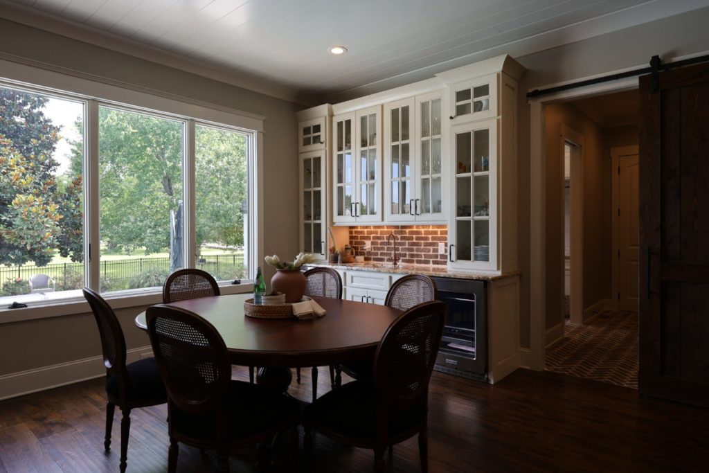 Dark dining area before AI HDR real estate photo editing