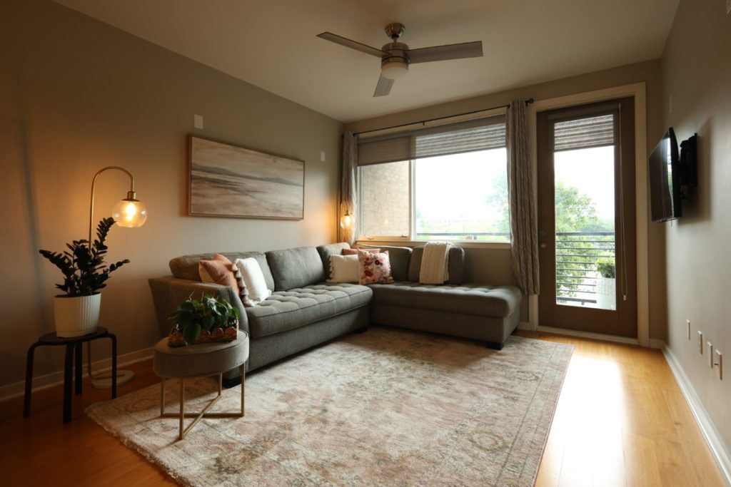 Underexposed living room before AI HDR photo editing