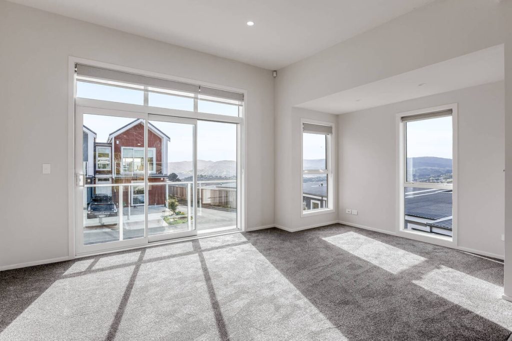 Empty living room before applying the best AI virtual staging.