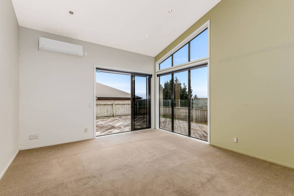 Empty living room before applying the best AI virtual staging.
