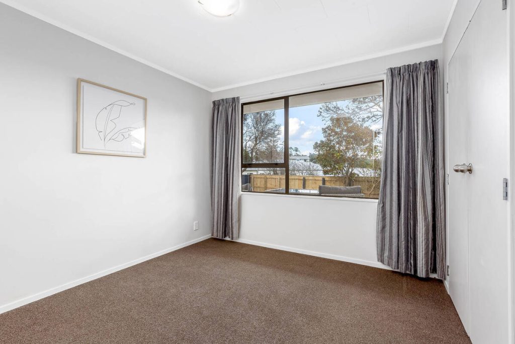 Empty bedroom before applying the best AI virtual staging.