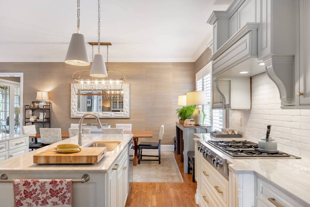 Kitchen after AI real estate photo editing with color correction and balanced lighting.