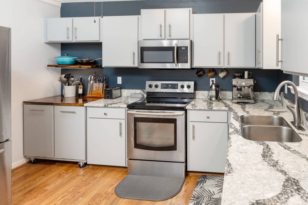 Kitchen after AI real estate photo editing with straight lines and perspective correction.