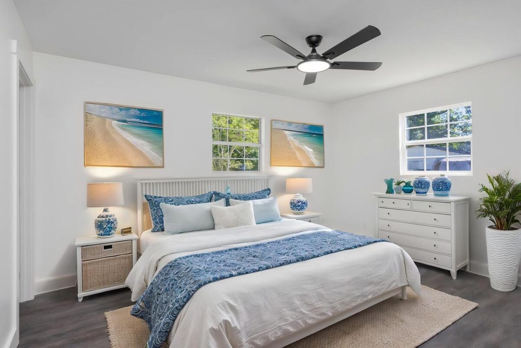 Blue and white coastal bedroom designed with the best AI virtual staging for real estate