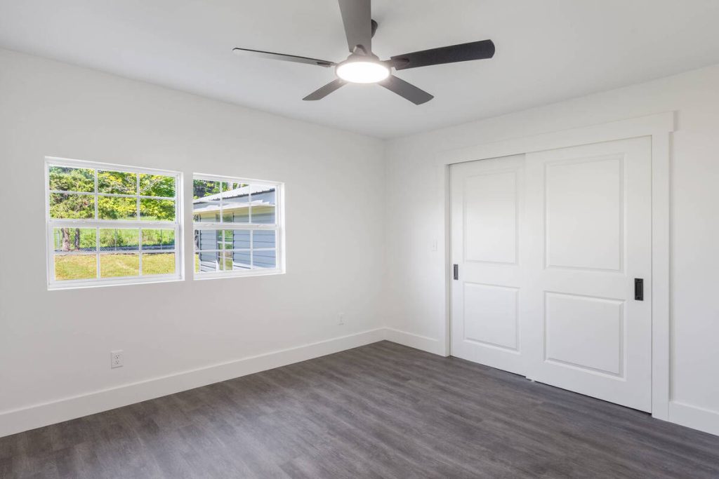 Empty rustic bedroom before using the best AI virtual staging for real estate