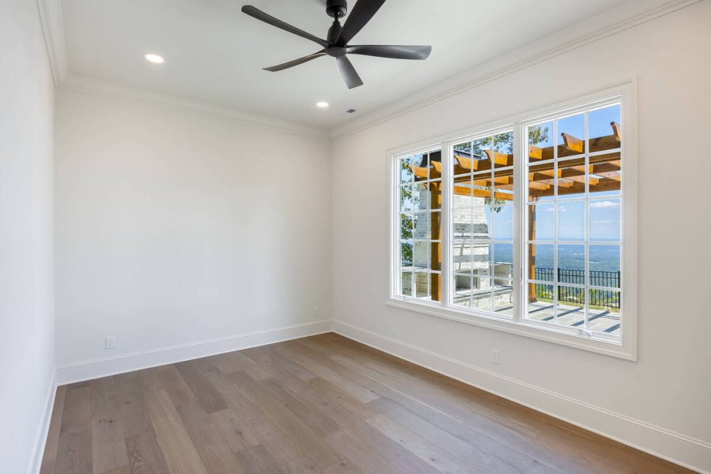 Empty midcentury bedroom before using the best AI virtual staging for real estate