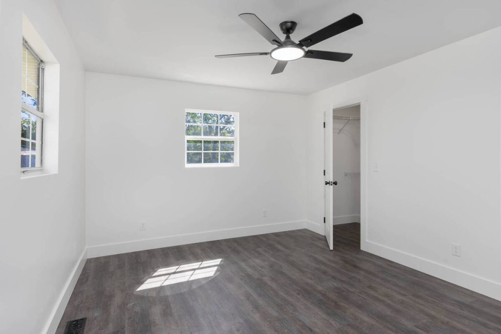 Empty industrial bedroom before using the best AI virtual staging for real estate