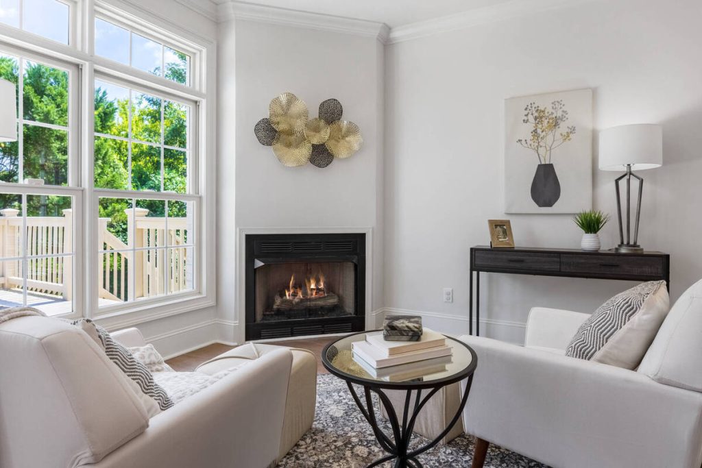 Sitting room with clear window views and balanced lighting using real estate HDR photo editing services