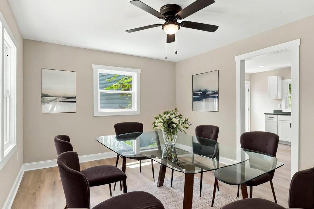 Real estate photo editor showing a professionally staged dining room