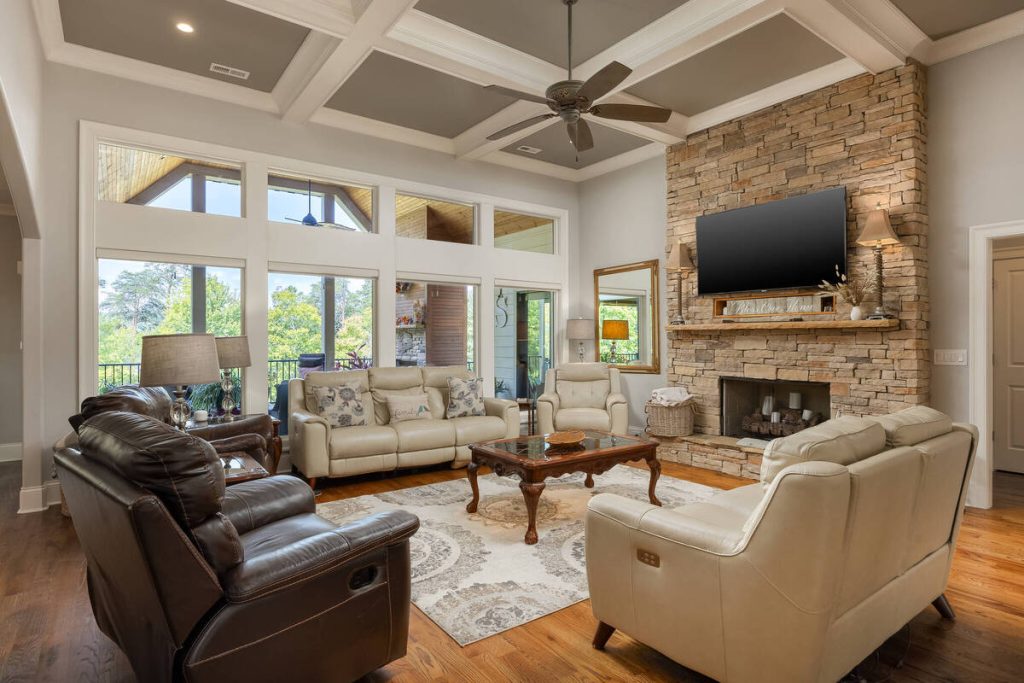Real estate image editing showing a brightened living room with improved interior details