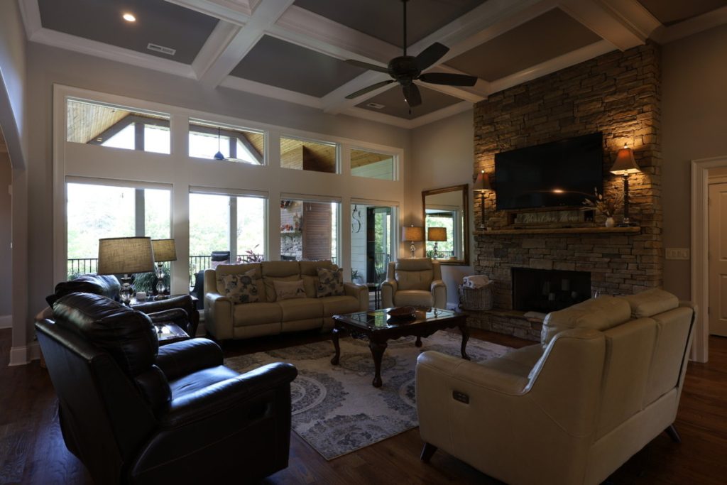 Real estate image editing example of an underexposed living room before enhancement