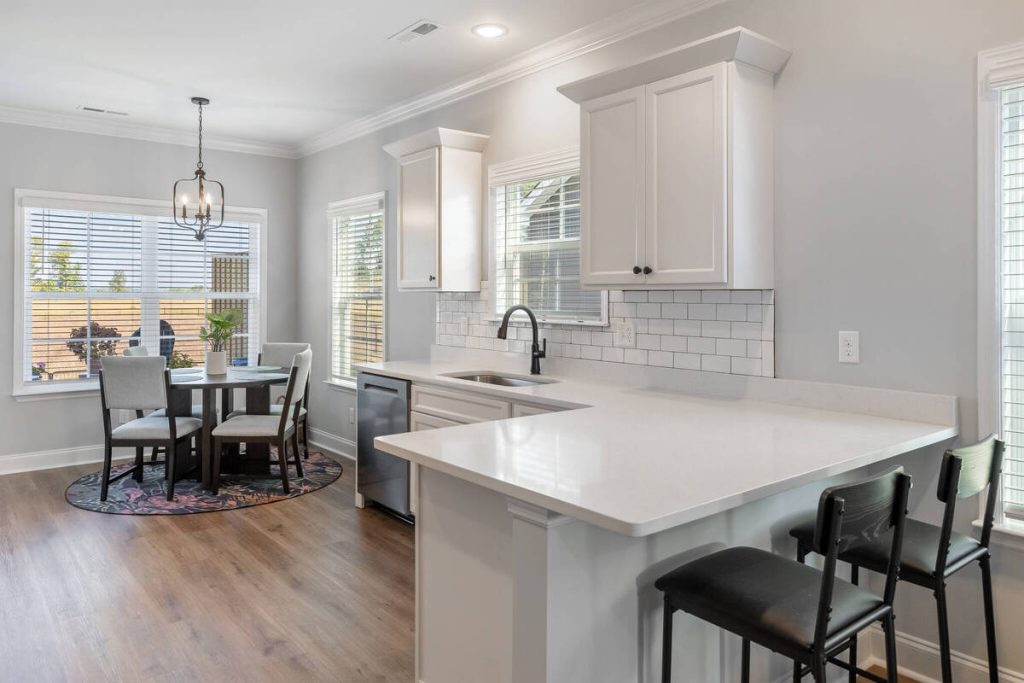 Real estate image editing showing a bright and balanced kitchen interior