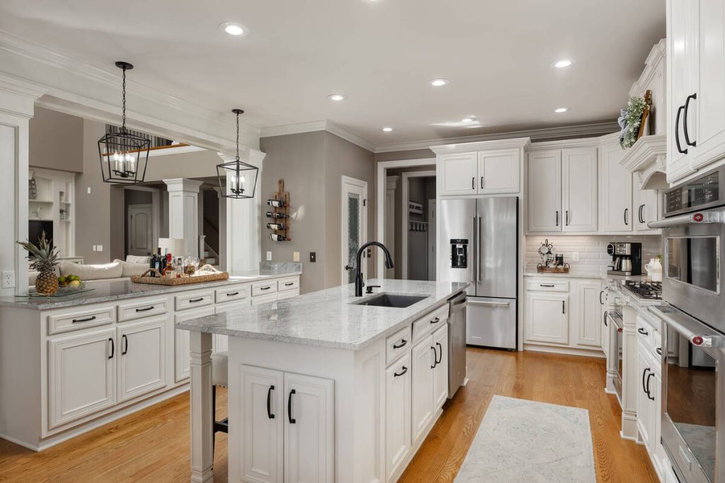 Modern white kitchen showing a finished space for virtual staging software planning.