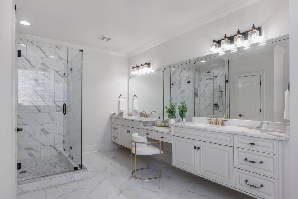 Luxury primary bathroom showing a finished space when considering virtual staging software.