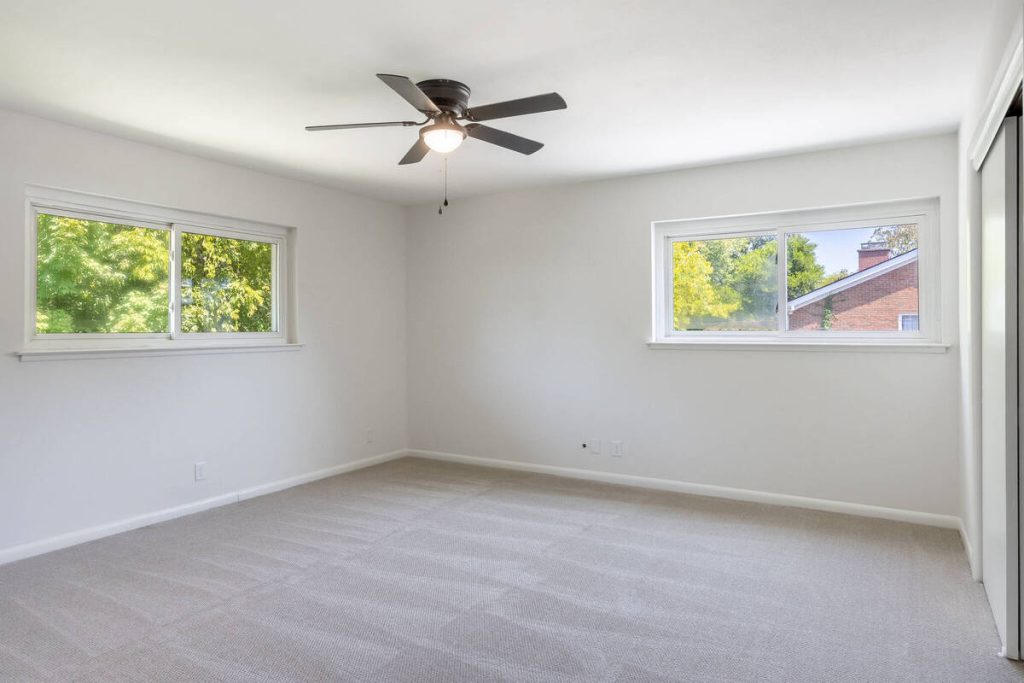 Empty bedroom before furniture is added with virtual staging software.