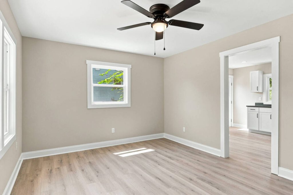 Empty dining room before being furnished with virtual staging software.